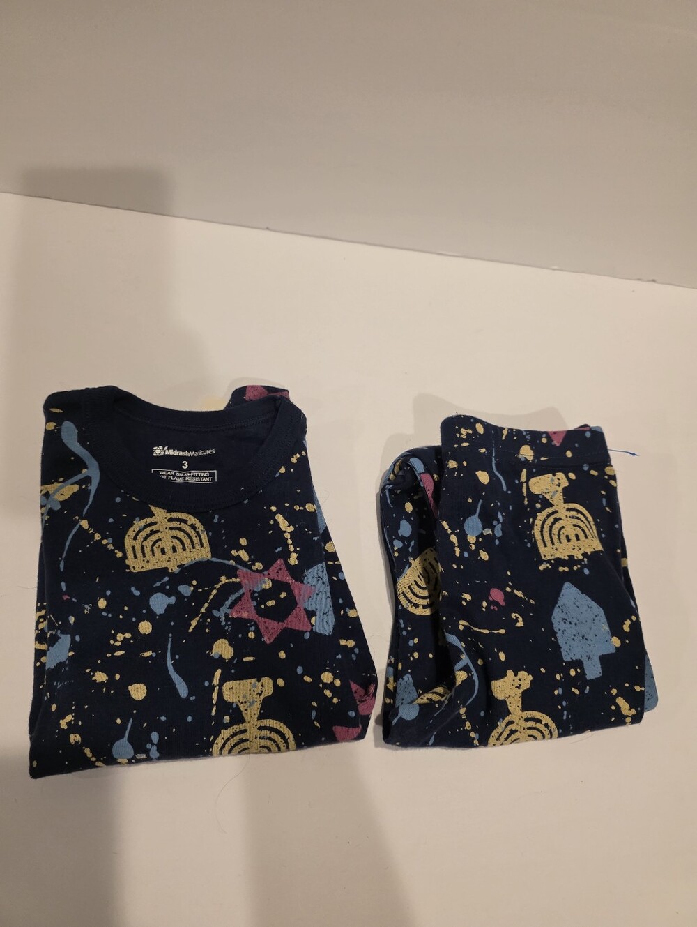 Kids Navy Pajama Set with Colorful Splatter and Hanukkah Motifs Midrash Manicure